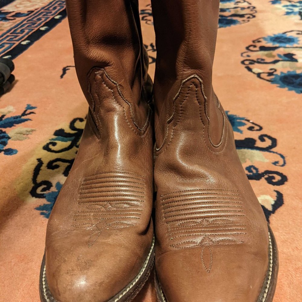 Brown leather cowboy boots with light designs on the top (Size 8)